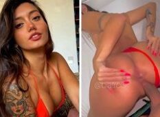 Beatriz Brunetti, uma jovem atraente, dançando sensualmente de quatro